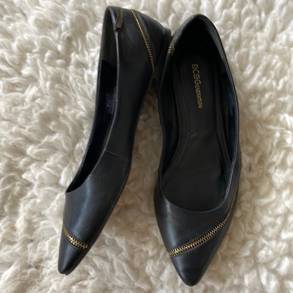 BCBGeneration black flats with gold zipper hardware